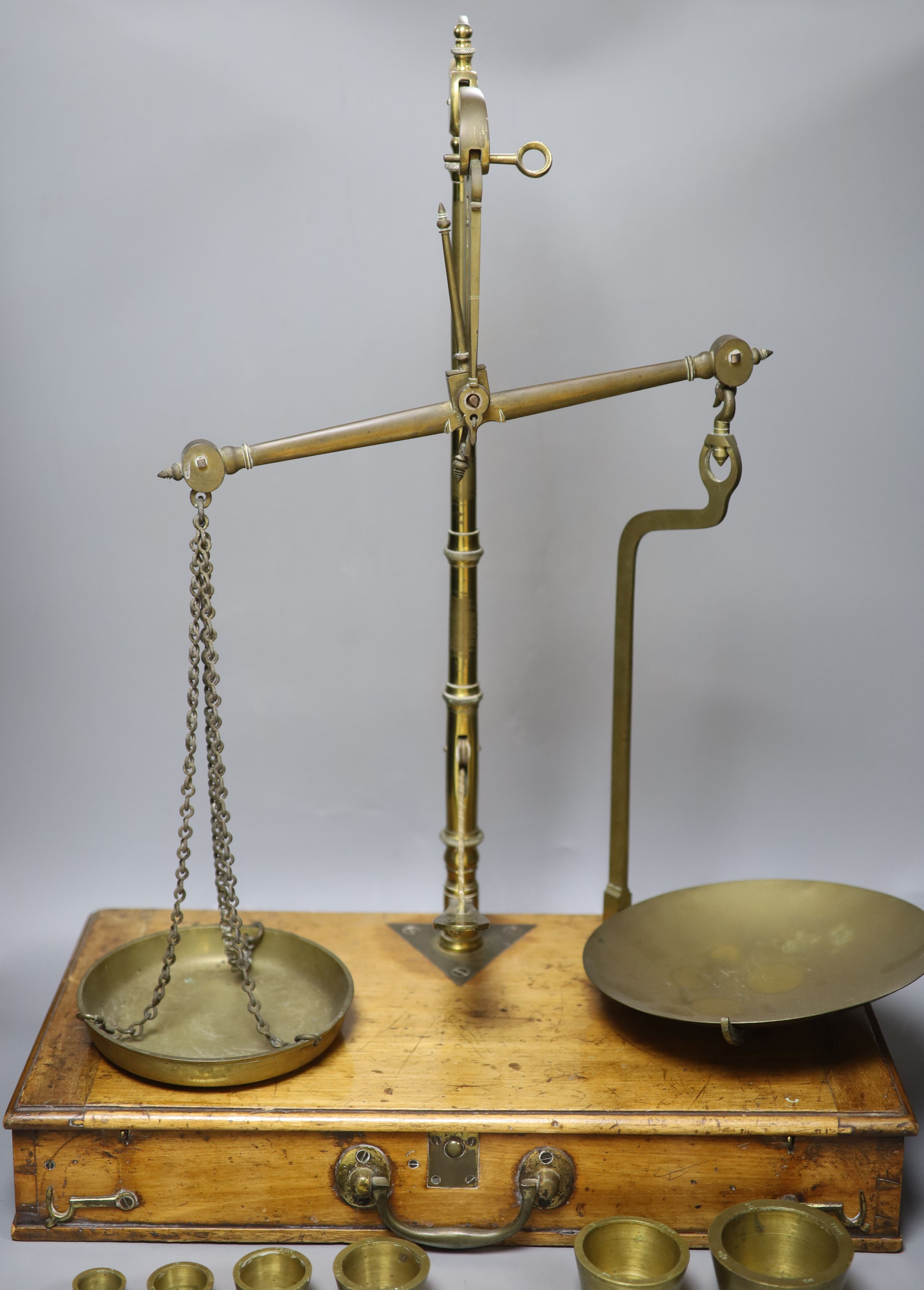 A set of mahogany brass scales by De Crave, Short Fanner & Co., width 50cm. height 70cm.